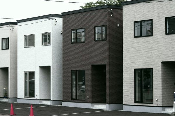 How can young investors break into the real estate market?